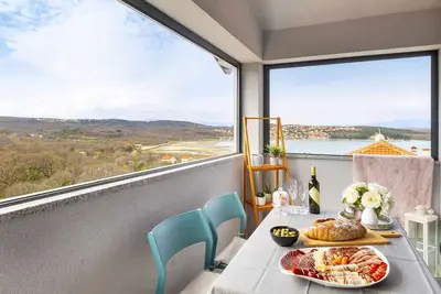 Image de Appartement de vacances avec balcon et vue mer