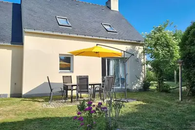 Image de Maison chaleureuse à 7 min des plages – Idéale pour les familles ou entre amis!