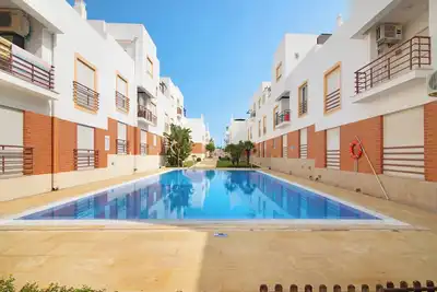 Image de Appartement 'Quinta Gomeira 59' avec piscine partagée, balcon et climatisation
