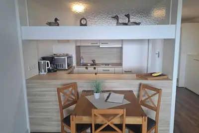 Image de 1 Zimmer App. mit Offener Amerikanischen Küchenbar