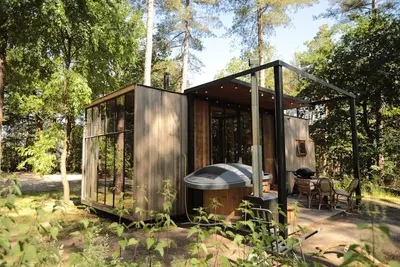 Image de A stress-free stay in this classic cabin with hottub