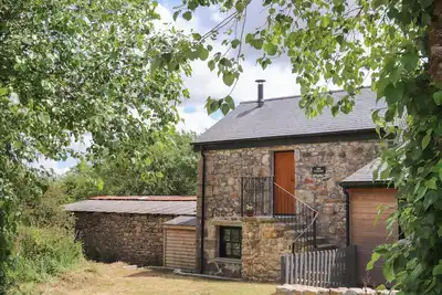 Image de The Hayloft, luxury holiday cottage, with open fire in Helston