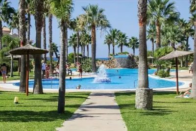 Image de Maison de vacances 'Acogedor Adosado' avec vue sur la mer, Wi-Fi et climatisation