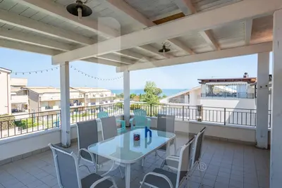 Image de Homiday - Tamerici - Penthouse with sea view terrace