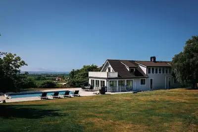 Image de Maison de vacances pour 12 a BÅSTAD-By Traum