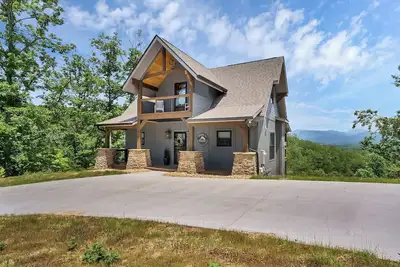 This brand new home with amazing views has a hot tub, gas fireplace, cable tv