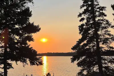 Lakefront Log Cabin with Hot Tub. Unique property with private lake access.