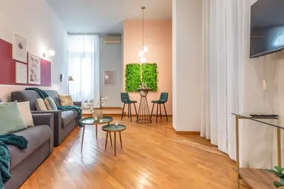 Image de Wine Apartments Florence Moscato 2 peut accueillir confortablement jusqu'à 6 personnes, dispose d'une chambre double, de deux canapés-lits doubles dans le salon, d'une cuisine équipée. En séjournant dans cet appartement, vous pourrez vous promener d