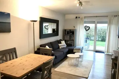 Image de Family-friendly 3-room apartment with private, fenced garden near the beach