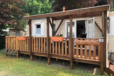 Image de mobil home 6 personnes avec terrasse à coté lac et remontée mécanique