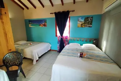 Image de Bungalow Rubis pour la famille, à 2 minutes de la plage et au bord de la piscine
