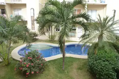 Image de Bright and Clean Condo in Villa Verde Ii, 5 min walk to beach