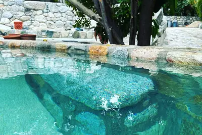 Image de Glamping orchard and suites with large stone kitchen and pool in Baja Sur.