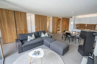 Image de Allegra und Herzlich Willkommen in der Ferienwohnung Chasa Loft 3 in Sent