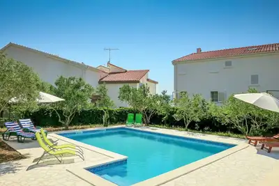 Image de Bel appartement pour 6 personnes avec piscine, Wifi, climatisation, Tv, balcon et parking