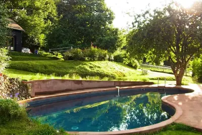 Image de Maison de vacances 'Maison, Piscine, Proche Deauville' avec piscine privée et terrasse partagée
