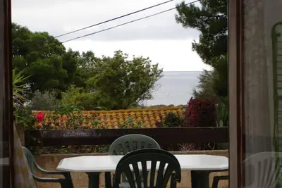 Image de Maison de vacances 'Maison Vacances Mer' avec vue sur le lac et terrasse privée