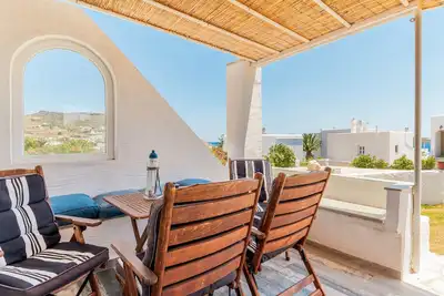 Image de Maison de vacances 'Porto Galini Tinos Syros 105' avec vue sur la mer, Wi-Fi et climatisation