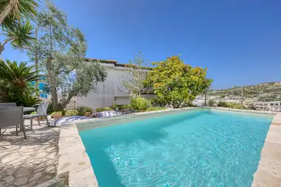 Image de Villa 'Blu La Patronale' avec vue sur la mer, piscine partagée et Wi-Fi