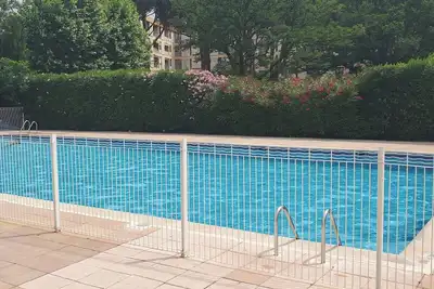Image de T2 moderne proche gare avec piscine
