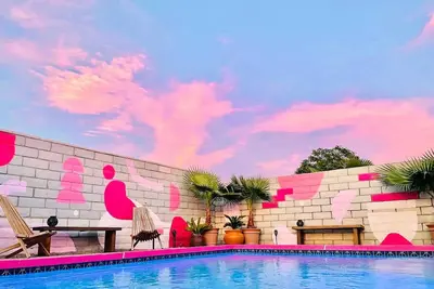 Image de Welcome to The Pink Cabana, where modern Moroccan meets luxe desert vibes.
