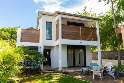 Image de Maison de ville avec jardin pieds dans le sable