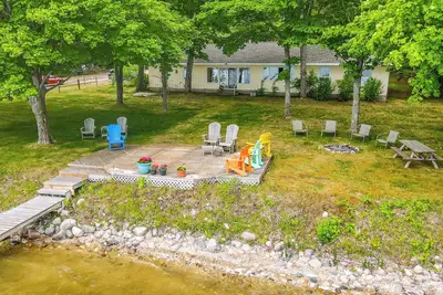 Waterfront Torch Lake Cottage w/ Dock & Fire Pit!
