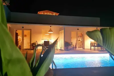 Image de Maison de vacances 'Villa Tino- Casa D' avec vue sur les montagnes, piscine partagée et Wi-Fi