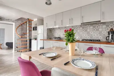 Image de Maison pour 7 à 100m de la plage - Jardin