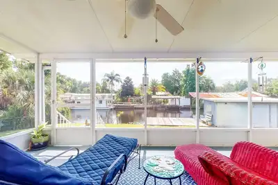 Image de Canal-Front Home with Private Covered Boat Dock & Waterfront Screened Porch
