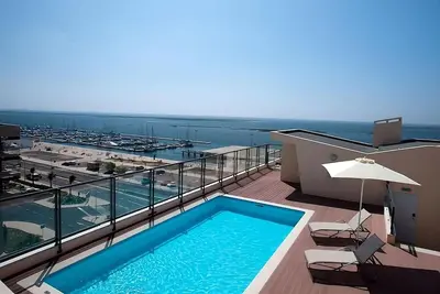 Group Getaway! 3 Spacious Apartments, Outdoor Pool, Check Out City of Faro!