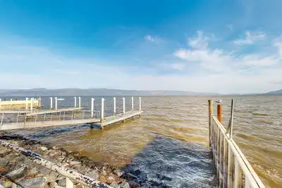 Image de Corner Lot Carriage House with Storybook Yard