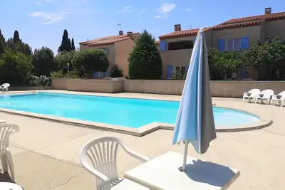 Image de Appartement pour 4  dans une residence au calme avec belle piscine sécurisée.