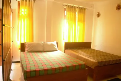 Image de For a Calm and Quite stay. \nAC Room\nBathroom with Hot water, Washing Machine.