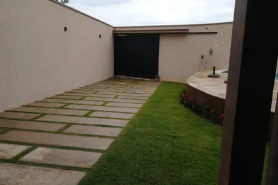 Image de Beautiful house on the sand in Itanhaem, 3 bedrooms, 2 suites, air conditioning, swimming pool, heating