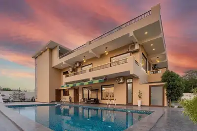Image de Stayvista at Asante Farms With Pool in Mangar