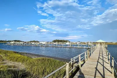 Spacious home, 24' boat slip, waterfront community\n