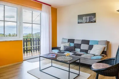 Image de Appartement \"Fuchs\" avec vue sur les montagnes, jardin partagé et Wi-Fi