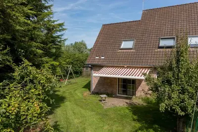 Image de Maison de vacances א Vrouwenpolder avec jardin