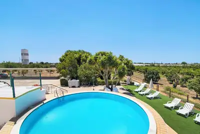 Image de Maison de vacances 'Quinta Alegre Tavira T2' avec piscine partagée, Wi-Fi et climatisation