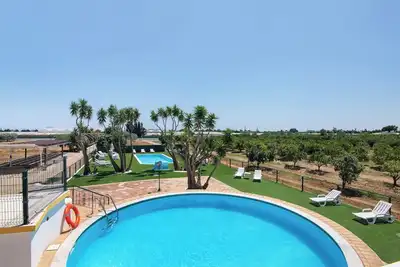 Image de Maison de vacances 'Quinta Alegre Tavira T2' avec piscine partagée, Wi-Fi et climatisation
