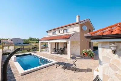 Image de Maison de vacances pour 8 personnes env. 100 qmà Privlaka, Dalmatie (Nord de la Dalmatie)