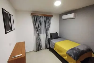 Image de Bonita y Cómoda Casa a Minutos del Aeropuerto