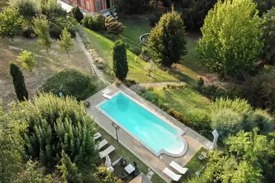 Image de Maison de vacances 'Cascina Solaro' avec piscine partagée, jardin et Wi-Fi