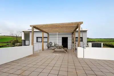 Image de Maison de vacances \"Casa da Bunganvilias\" avec vue sur la mer, terrasse privée et Wi-Fi