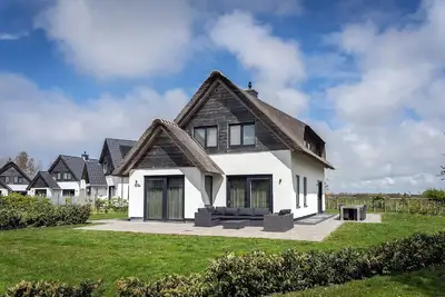 Image de Villa de chaume près de la mer de Texel