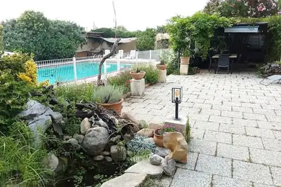 Image de Lovely  spacious one level gîte with shady terraces, pool, billiard/music room