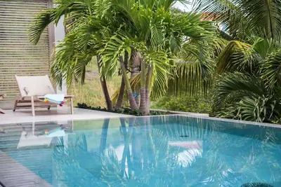 Image de Palm - a private setting in the hills above the Grand Cul de Sac lagoon
