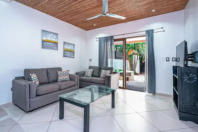 Lovely home close to the beach/shops with inviting patio, washer/dryer & games