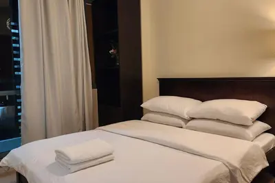 Image de Two Palm Tree Villa 4pax Airport & Entertainment Hub – Pool, Gym, WiFi Included!